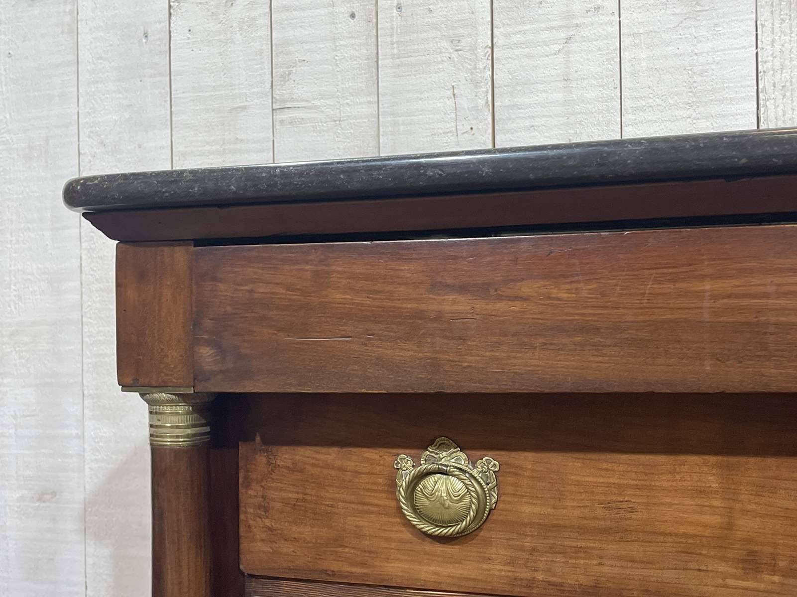 19th century Empire chest of drawers in cherry wood and black marble