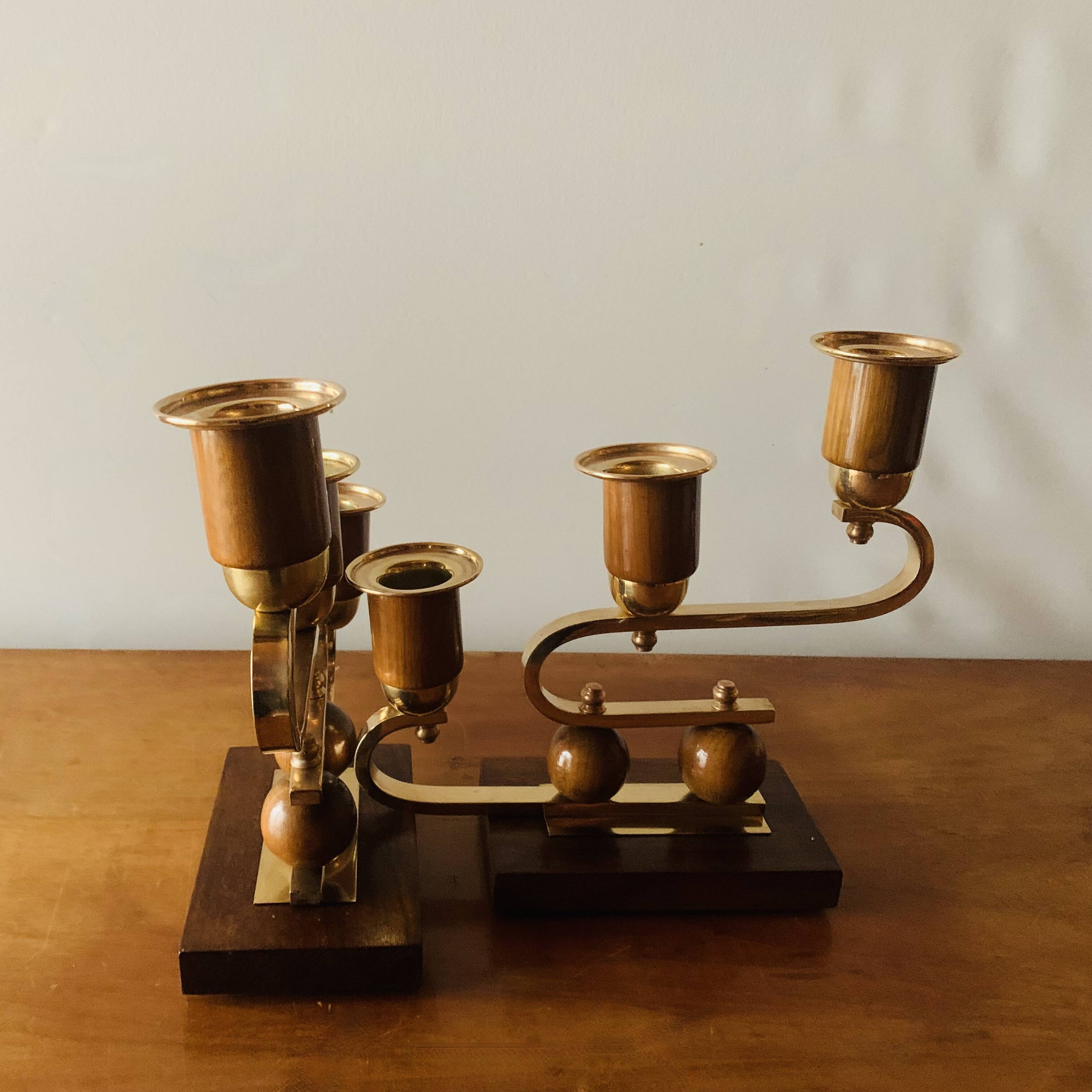 Pair of Art Deco candlesticks in gilded brass and wood