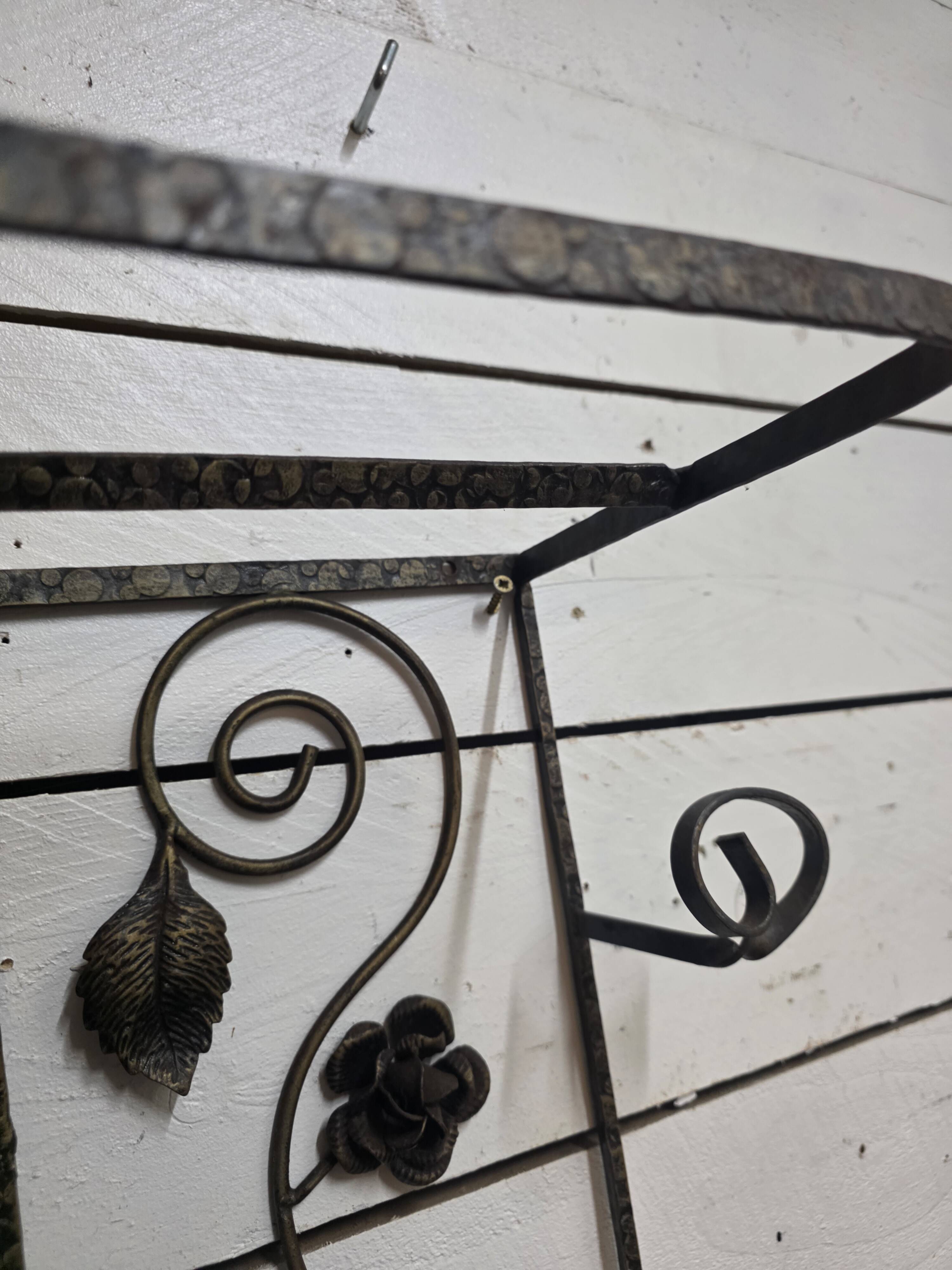 Art Deco coat rack in hammered wrought iron, 1950s.