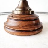 Pair of antique wooden and brass candlesticks