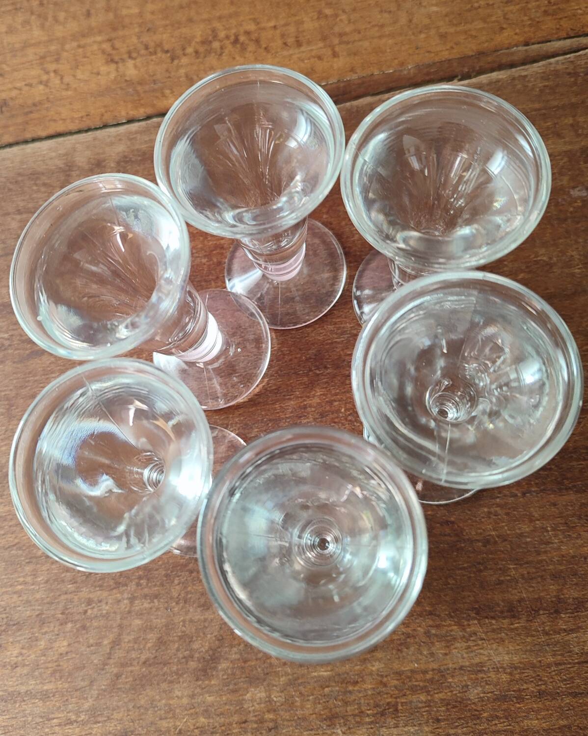 Set of 6 antique glasses known as "false bottom" glasses.
