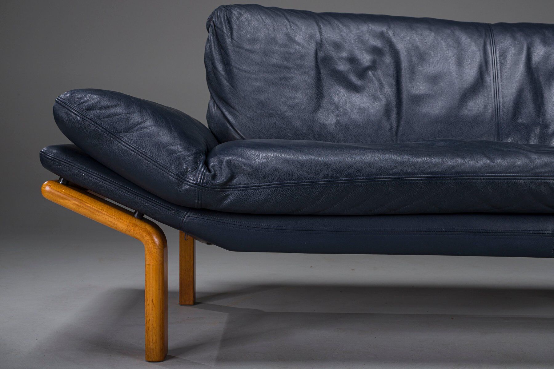 Danish teak and navy blue leather 3-seater sofa from Komfort, 1970s