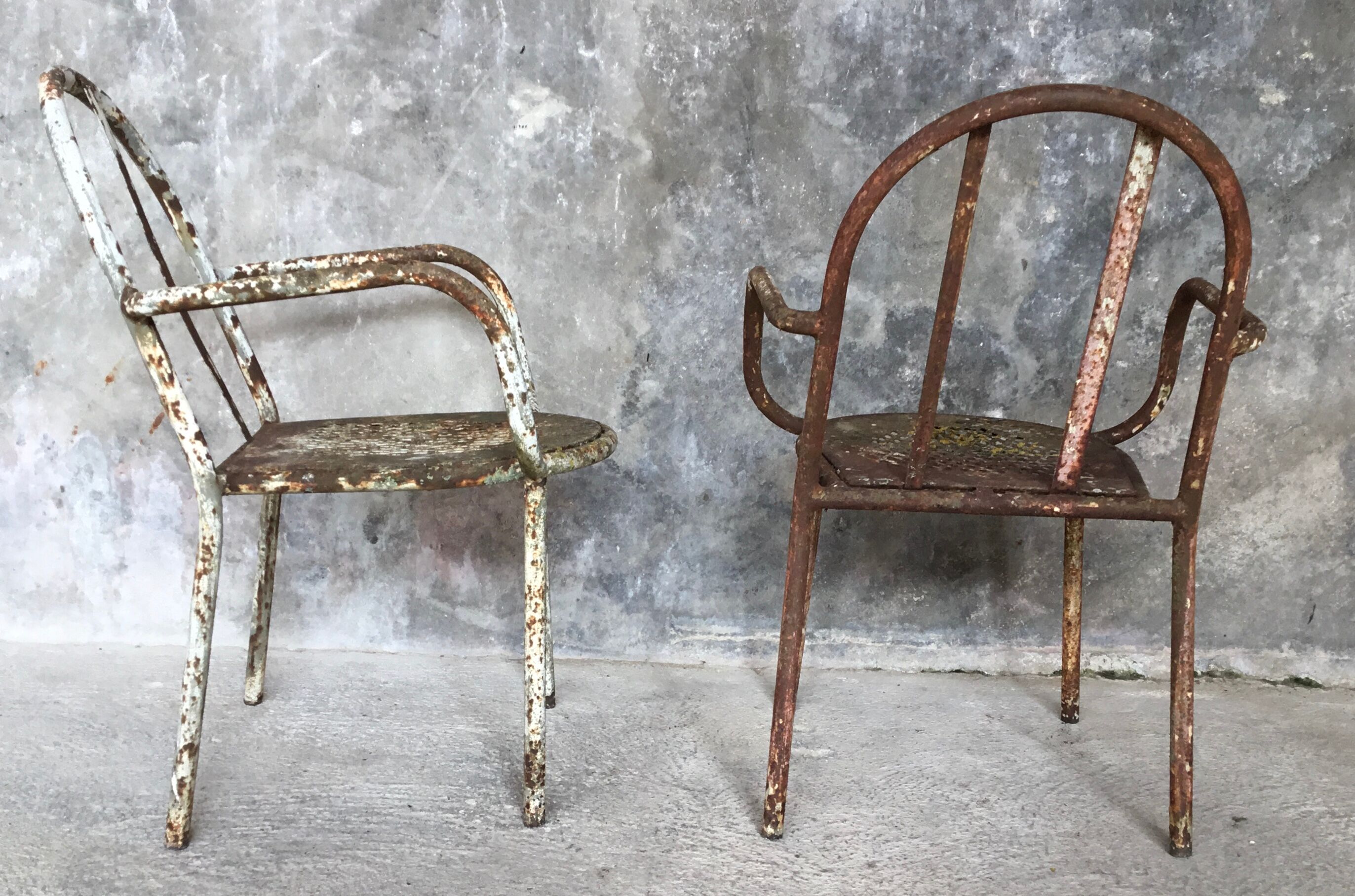 Pair of metal armchairs