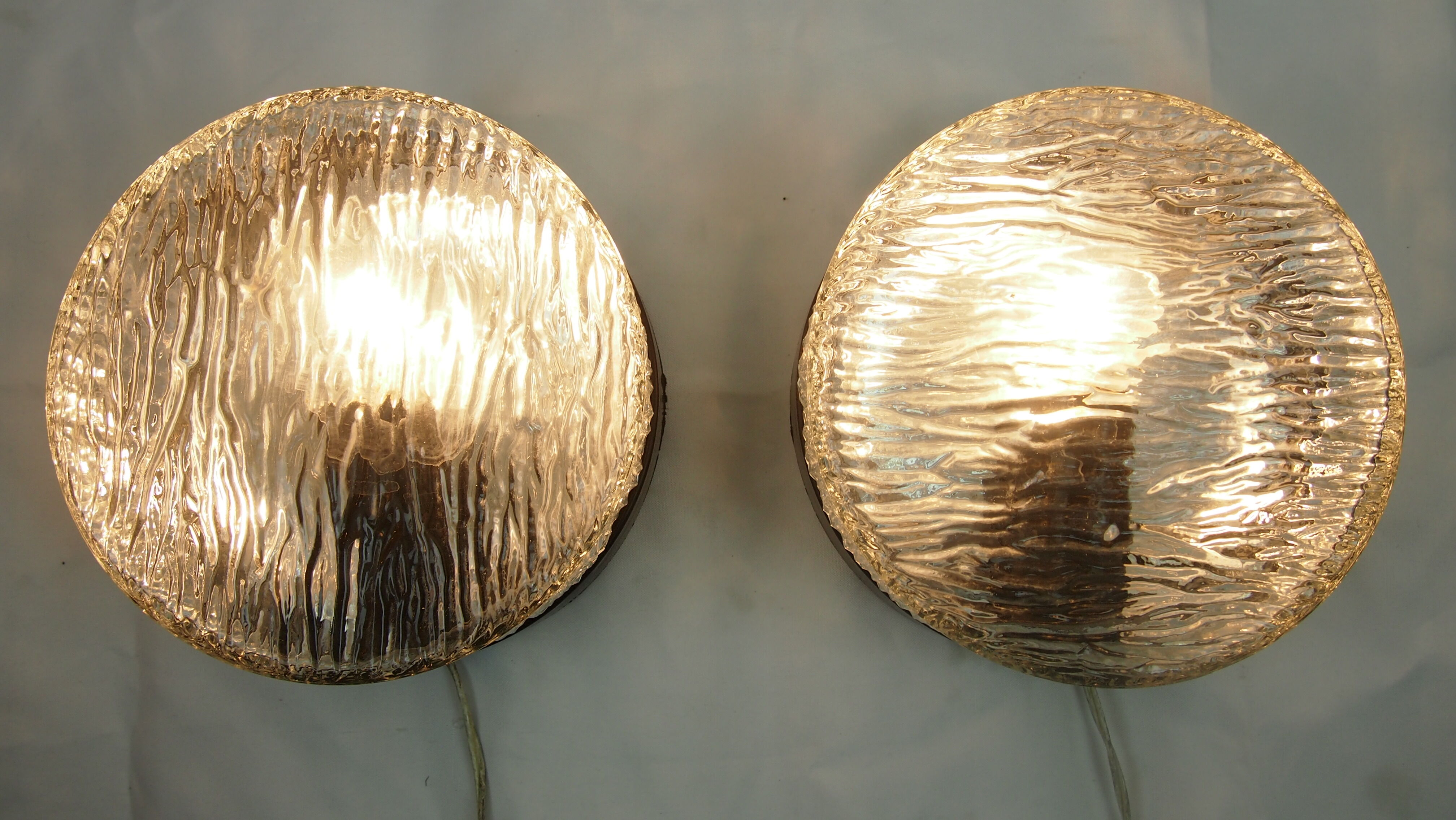 Pair of mapelec textured glass wall lights, 1970