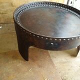 Riveted metal table