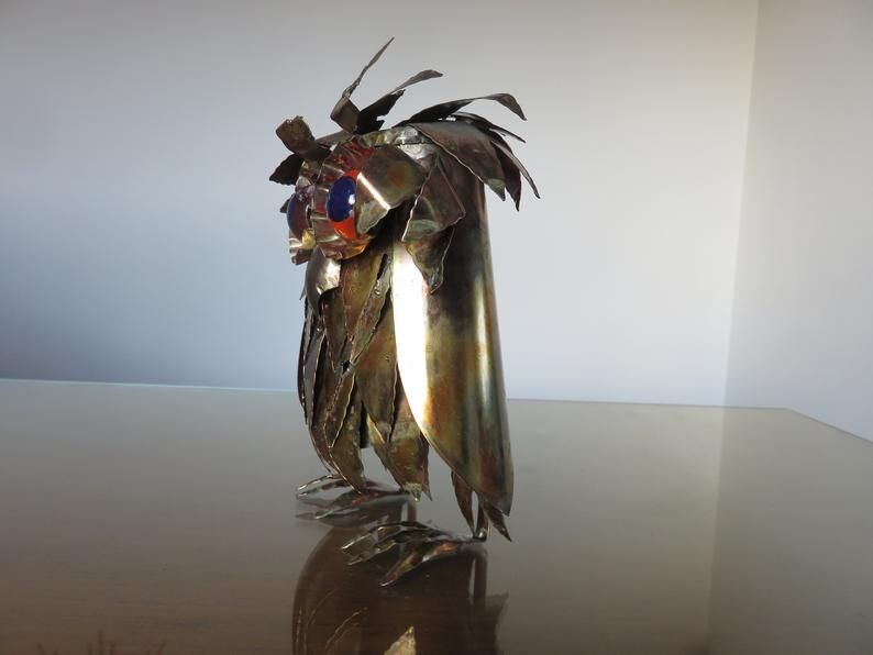 Owl in 1970s brutalist plate