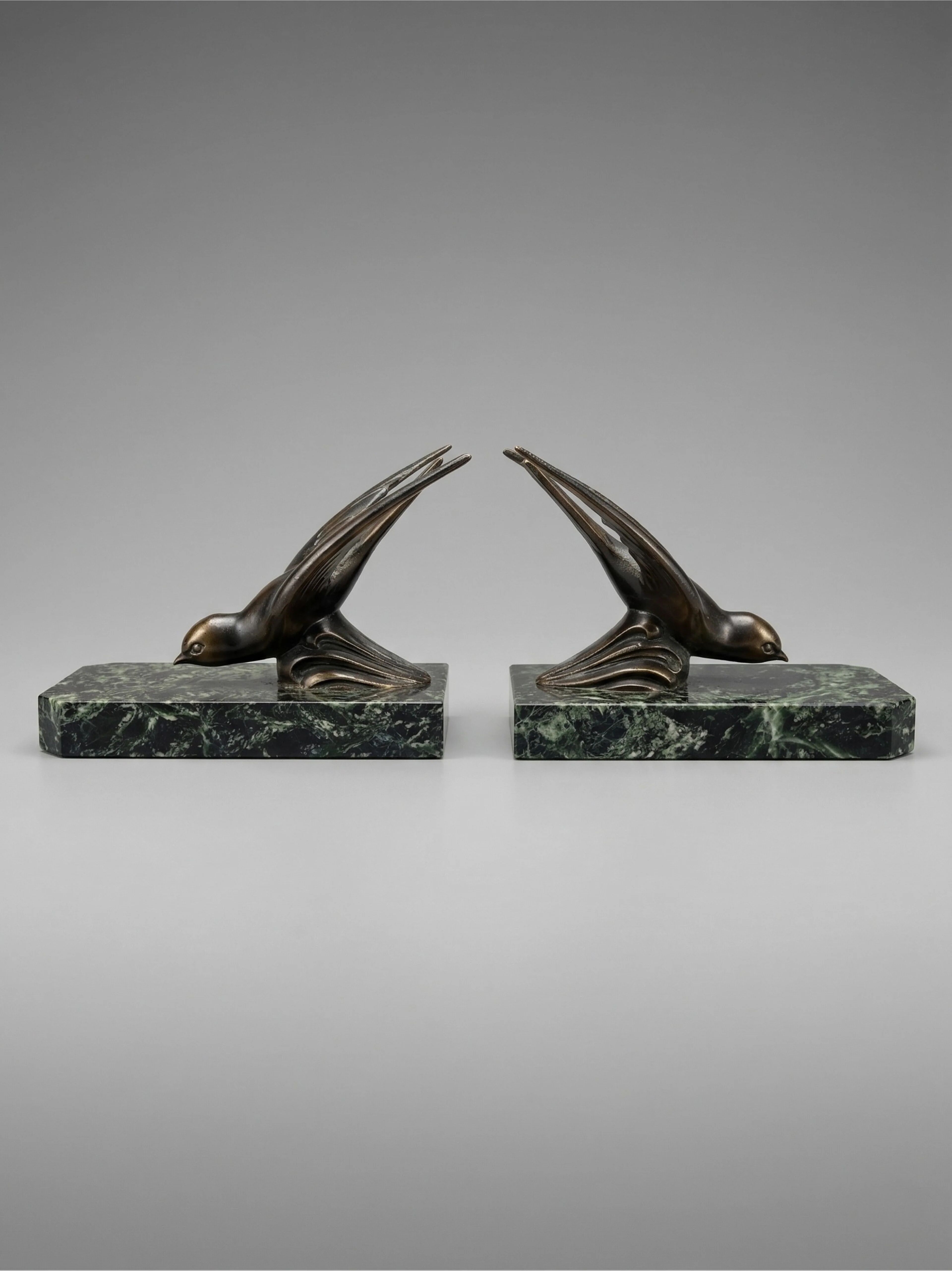 Art Deco bookends – Swallows in spelter on marble bases