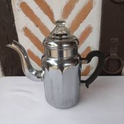 Silver metal coffee maker with glass cap