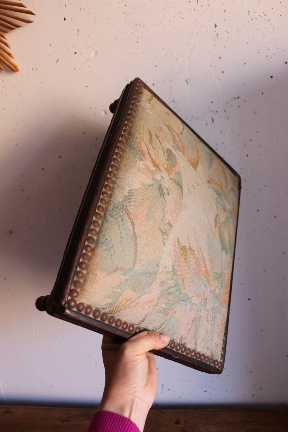 Small antique wooden and fabric footrest.
