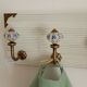 Wall-mounted coat rack 50 cm – 4 hooks and decorative central button