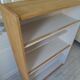 Vintage library in oak veneer, pearl grey interior, metal legs.