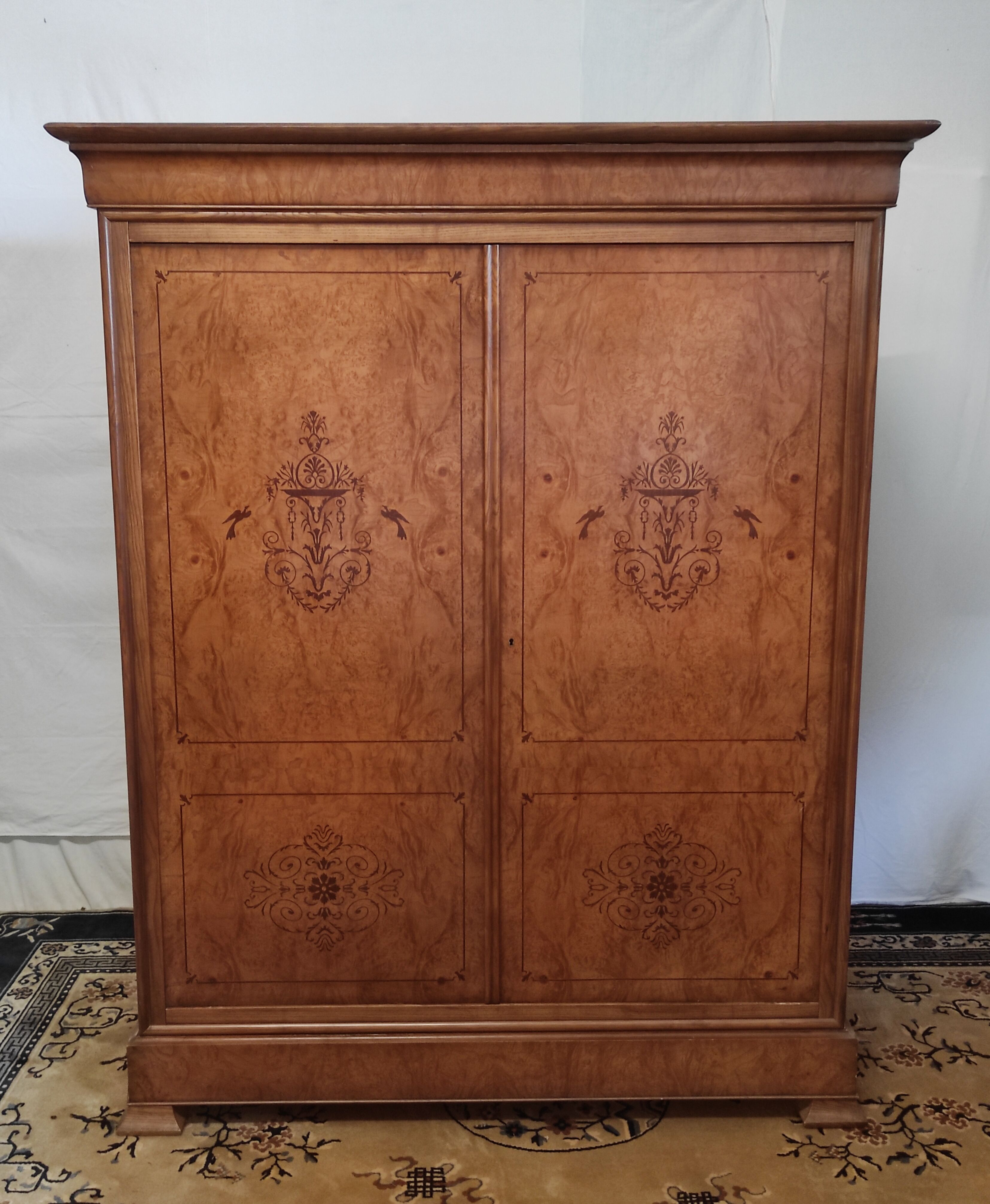 Charles x style cabinet in elm magnifying glass veneer