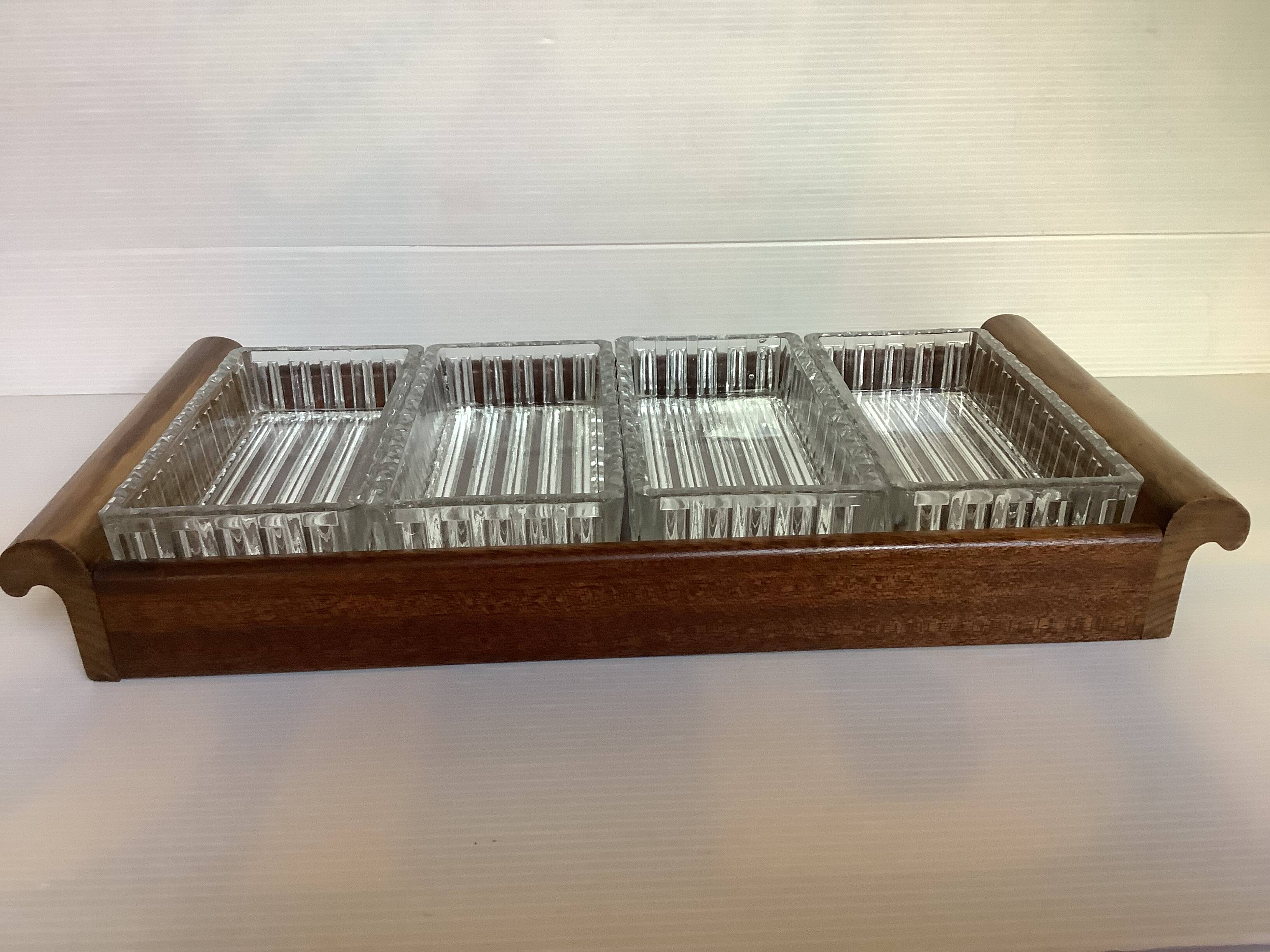 Old wooden serving tray and molded glass bowls
