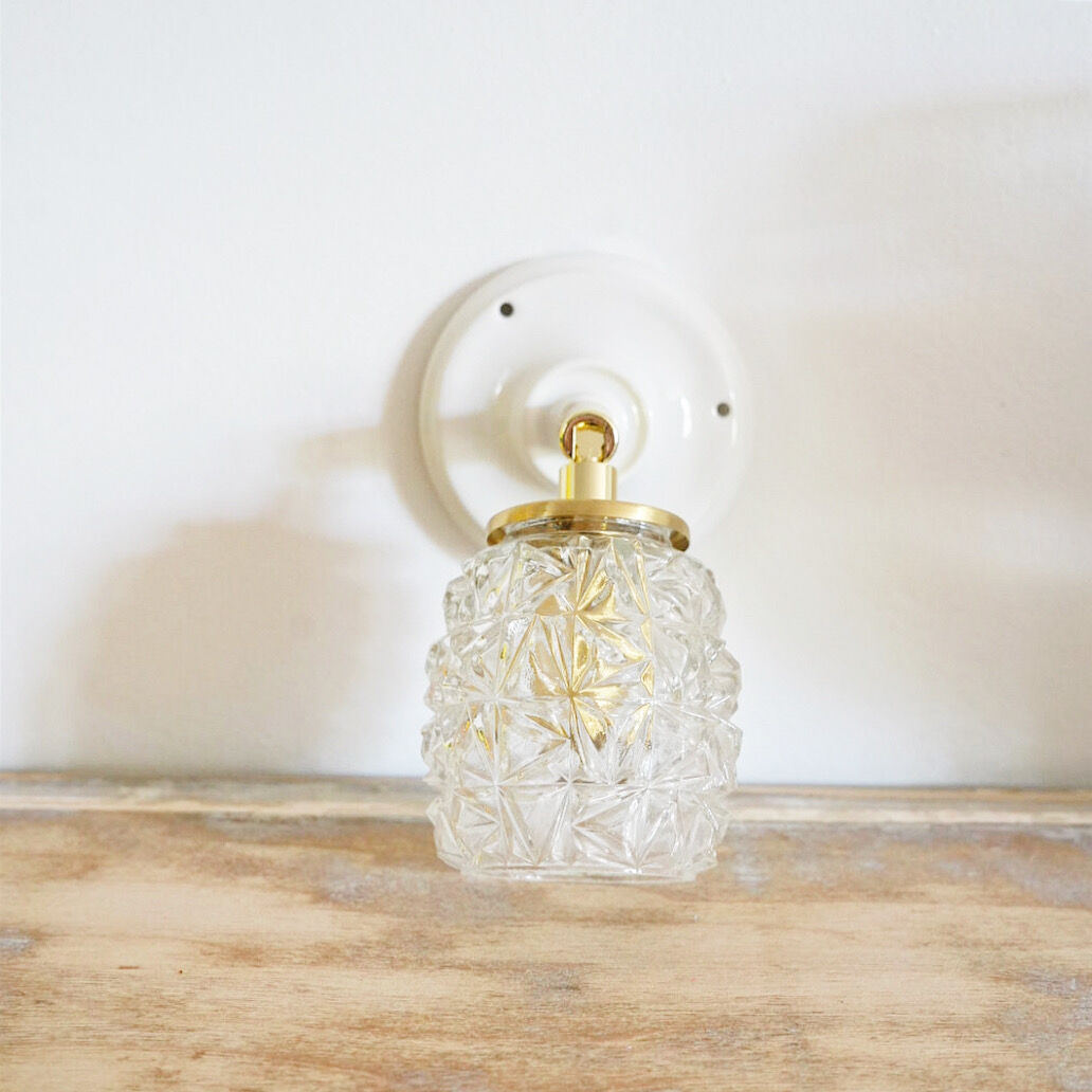 Carved glass wall lamp