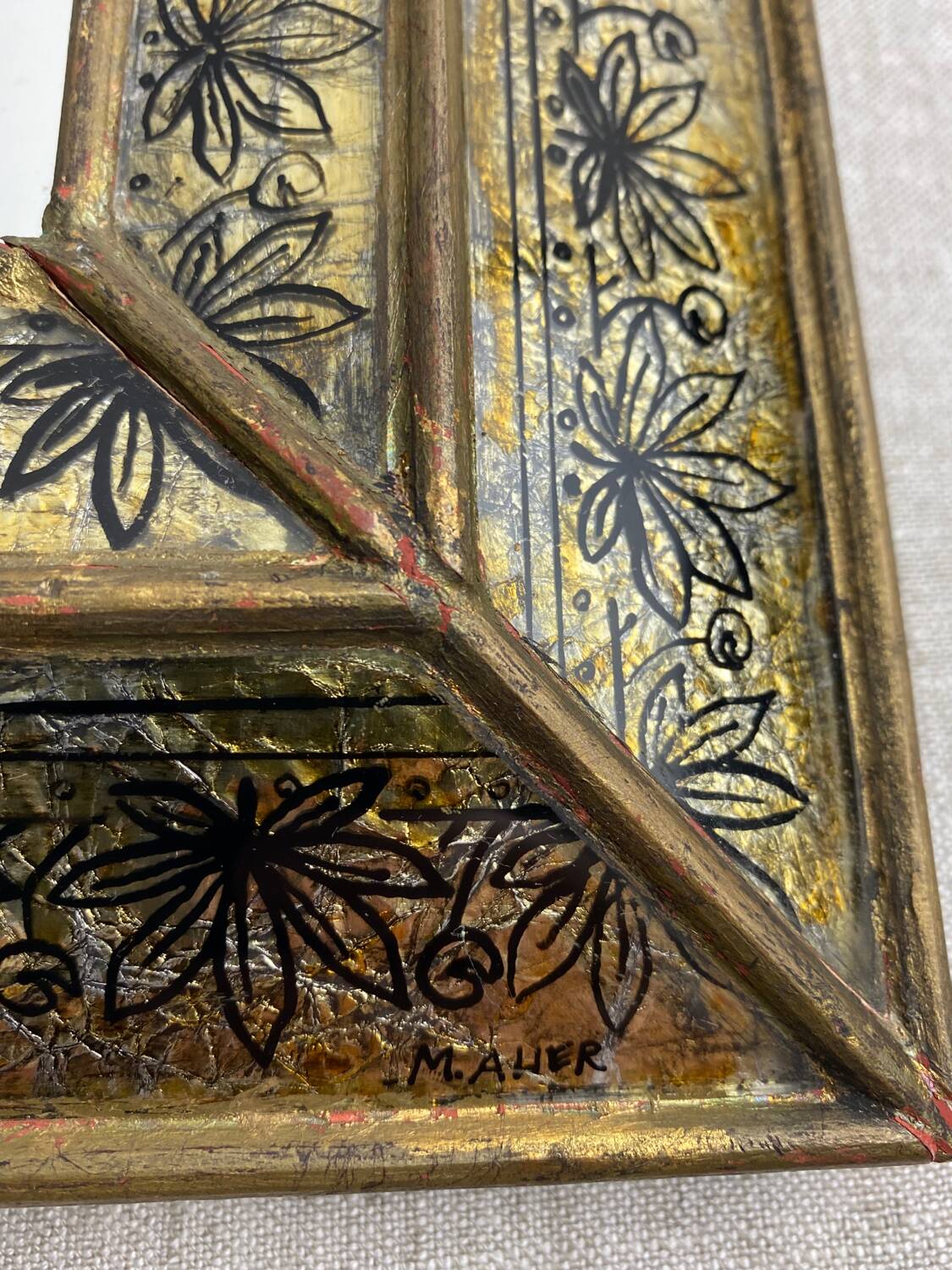 Eglomisé mirror with wooden parecloses