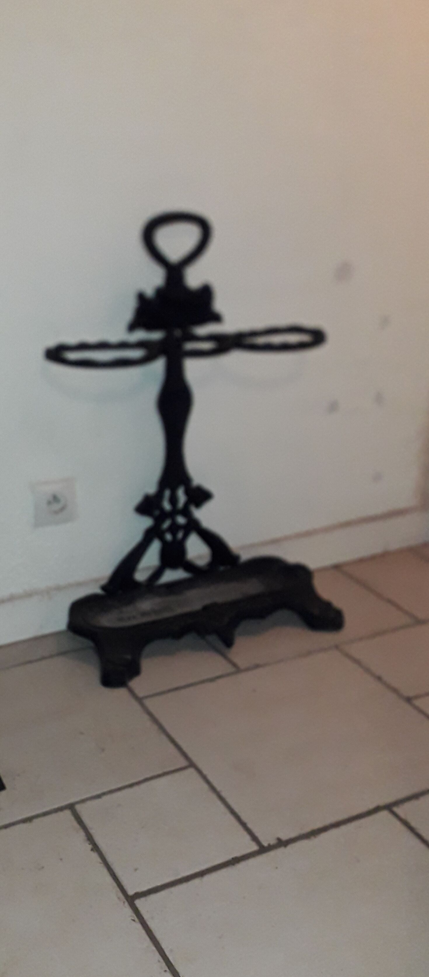 Porte parapluie en fonte