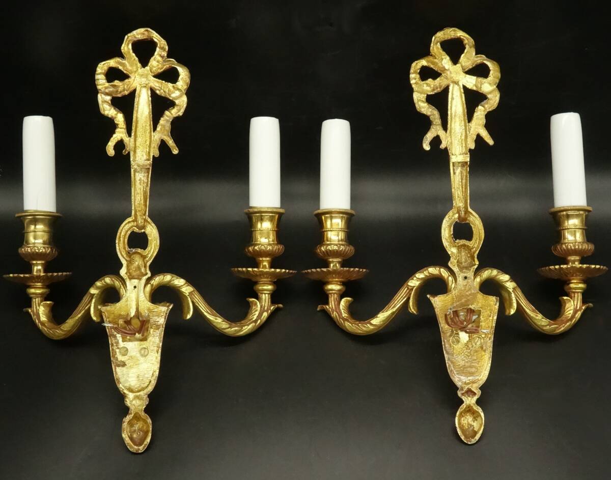 Pair of Louis XVI style knot wall lights - gilded bronze