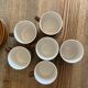 Vintage coffee service in brown stoneware from the 1970s.