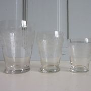 32 antique glasses engraved with Friezes of Arabic and spirals