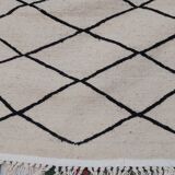 Handmade handmade Berber beige and black carpet in pure wool 216x147cm