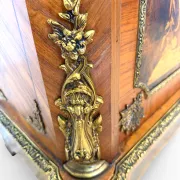 An antique French Louis XVI-style marble-top side cabinet