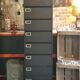 Industrial furniture with 10 metal flaps.