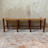 Rustic wood and straw bench