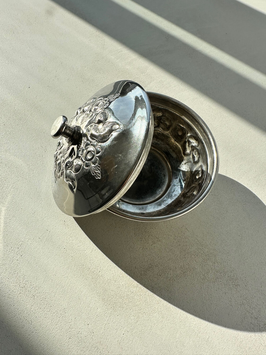 Antique silver-plated box with floral decoration