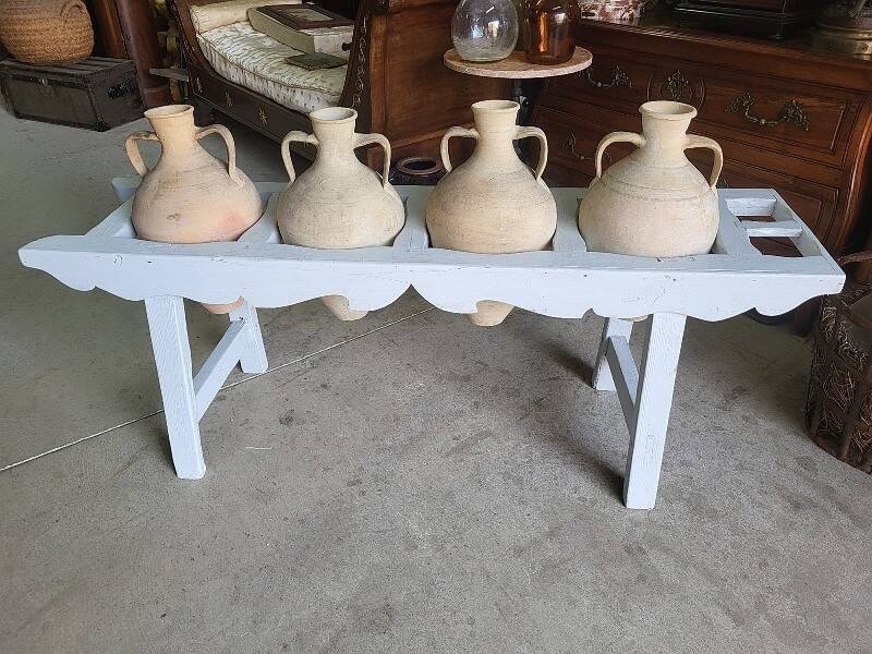 Antique painted wooden jar holder with 4 earthenware jars