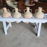 Antique painted wooden jar holder with 4 earthenware jars