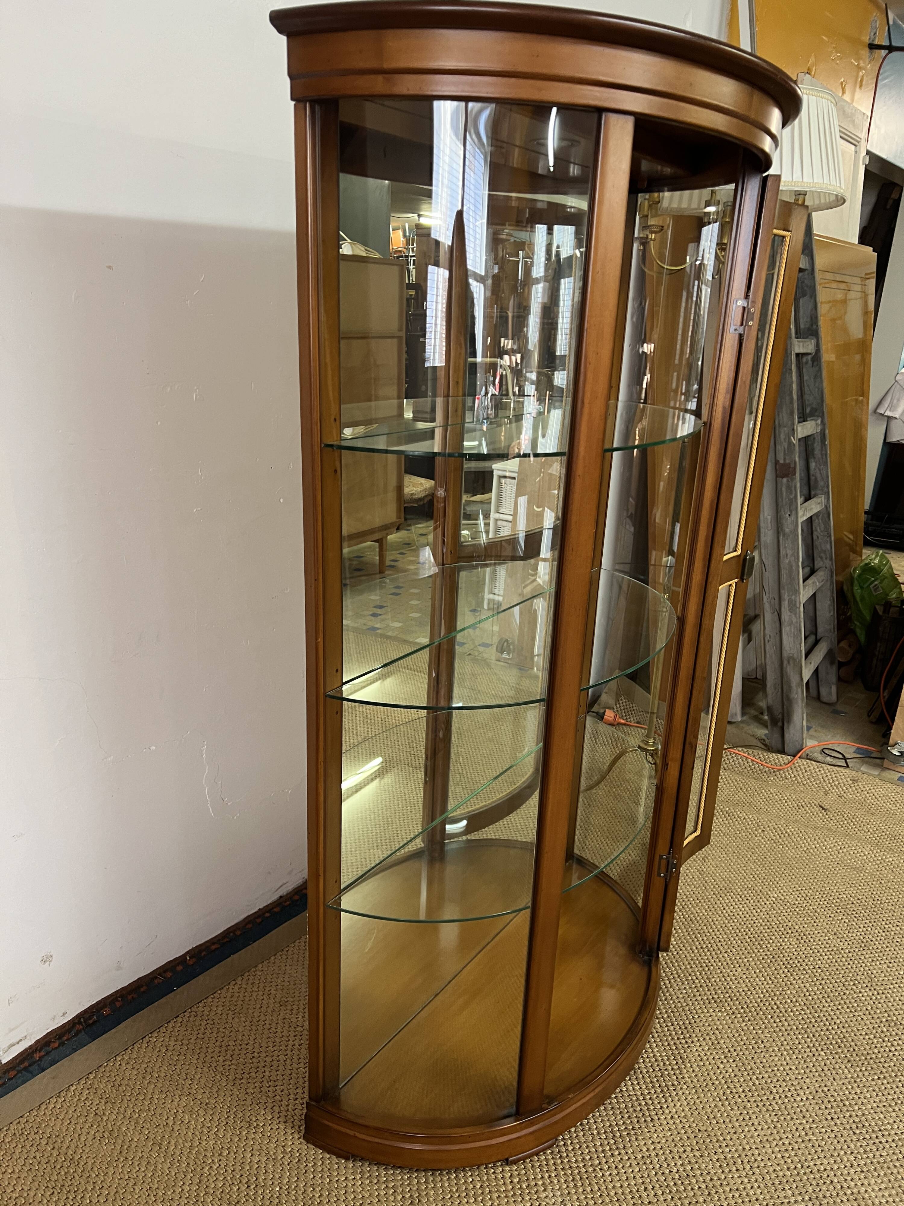 Wooden display case and half-moon mirror