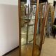 Wooden display case and half-moon mirror