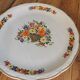 Digoin round dish, basket of flowers
