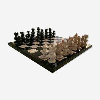 Pink and black marble chess game