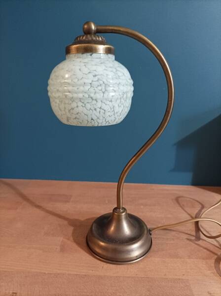 Bedside lamp in room with patinated golden globe Clichy blue