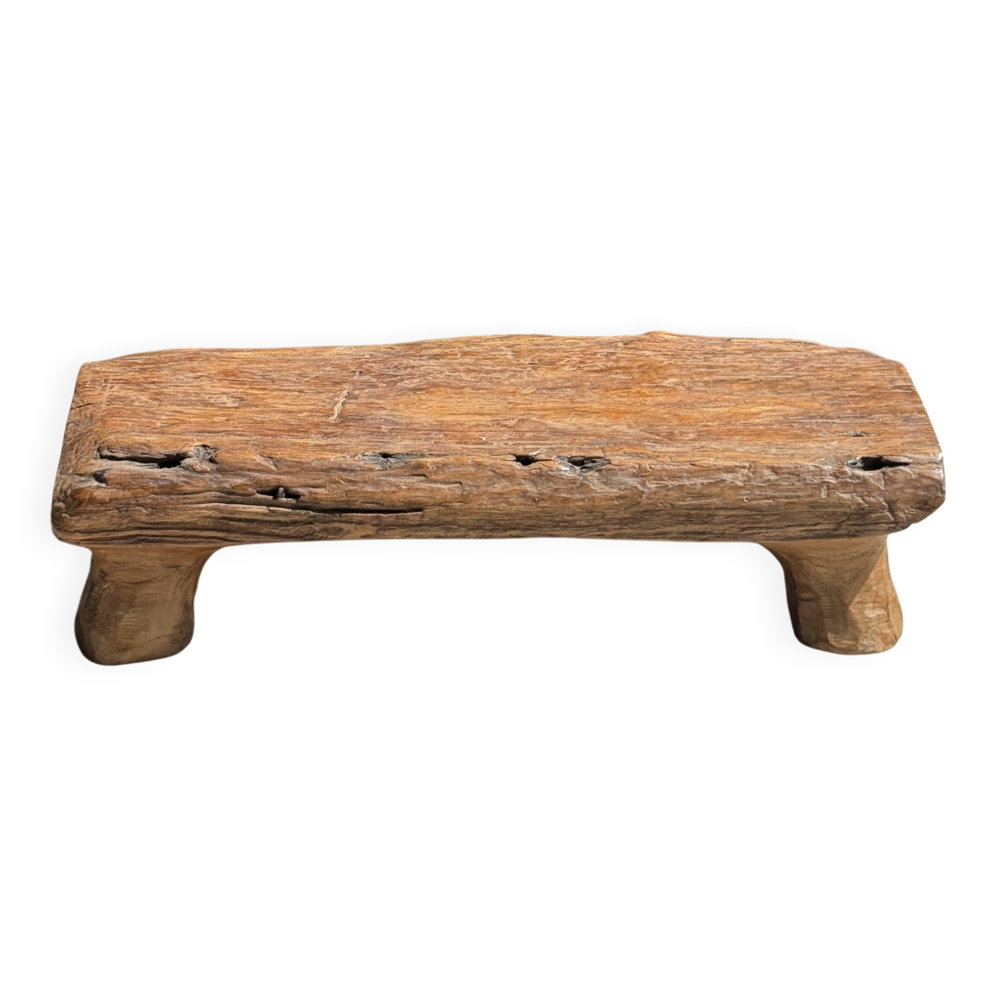 Small stool, footrest in blond teak, organic monoxyle with cut corners.