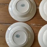 Set of eight Moulin des loups soup plates