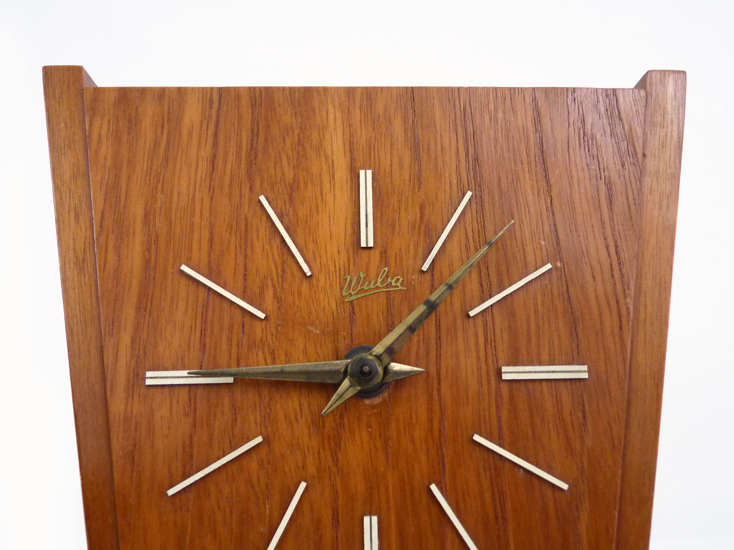 Table clock, art deco clock in Wuba Amsterdam in wood and brass. Year 50