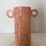 Pink ceramic vase with abstract circular handles