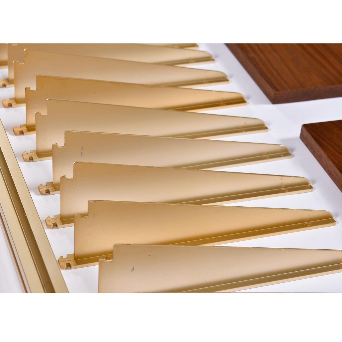 Tension pole free standing rose gold aluminum Omni wall unit by George Nelson