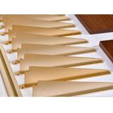 Tension pole free standing rose gold aluminum Omni wall unit by George Nelson