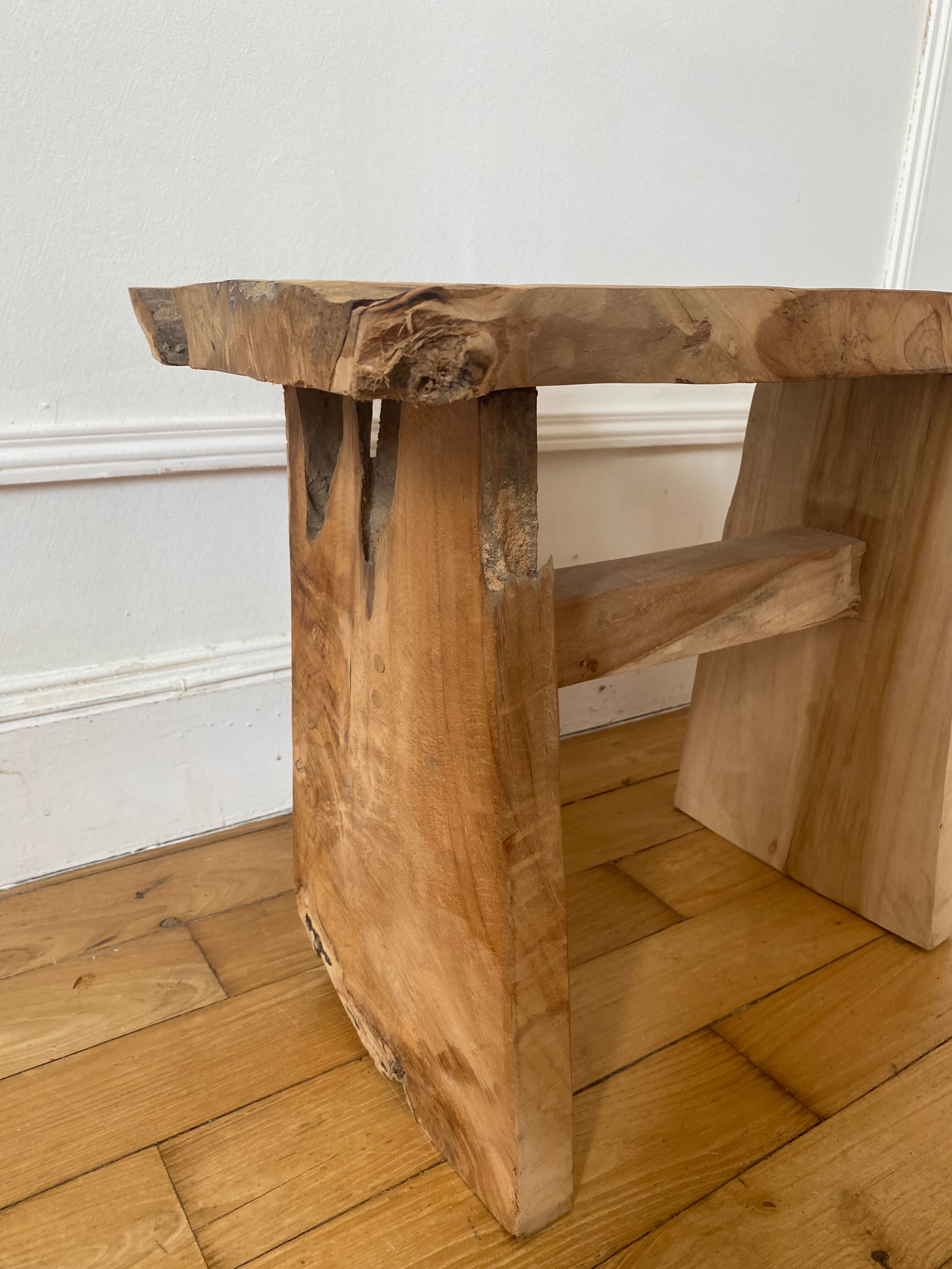 Low stool in raw wood
