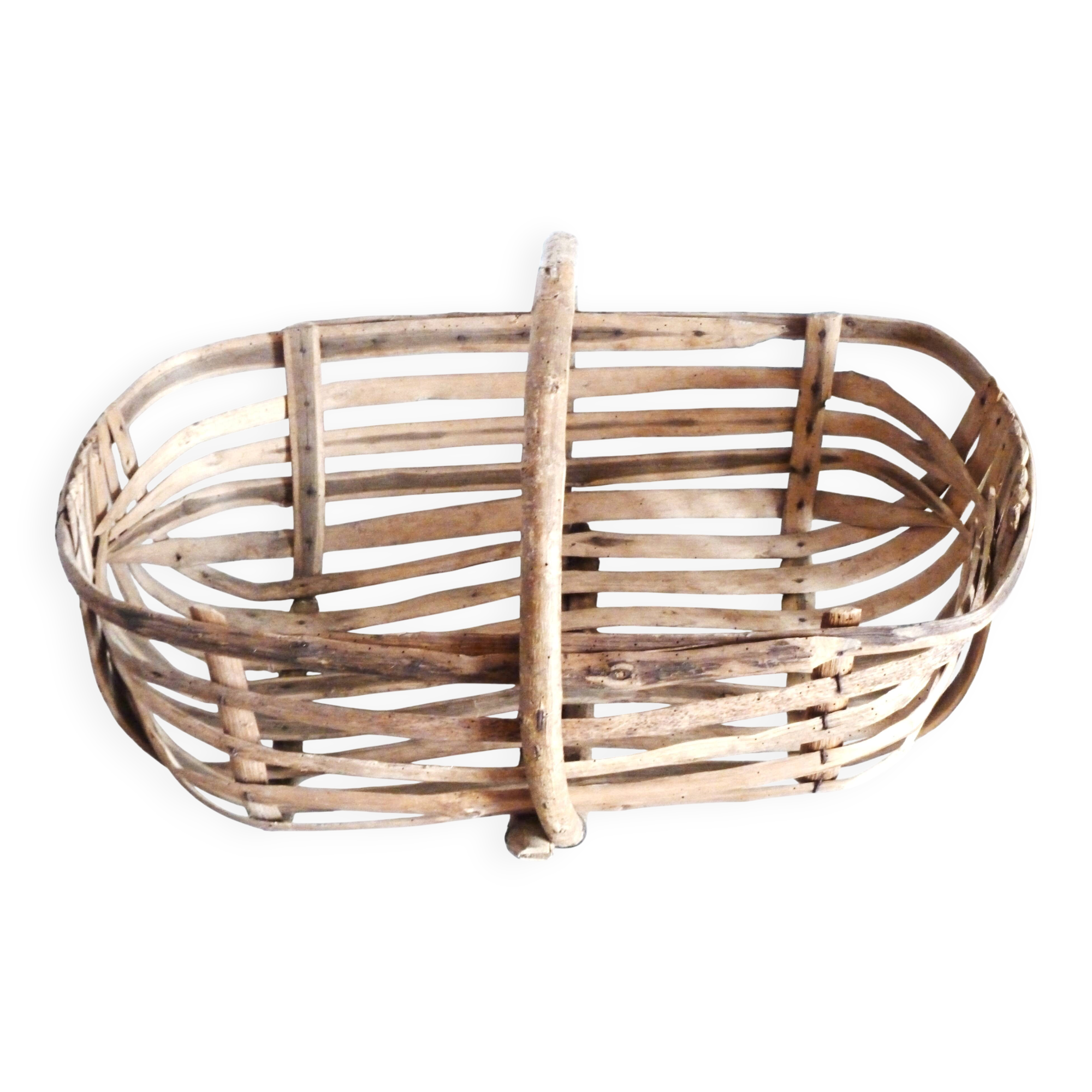 Old wooden harvest basket, slatted wooden basket, folk art.