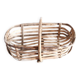 Old wooden harvest basket, slatted wooden basket, folk art.