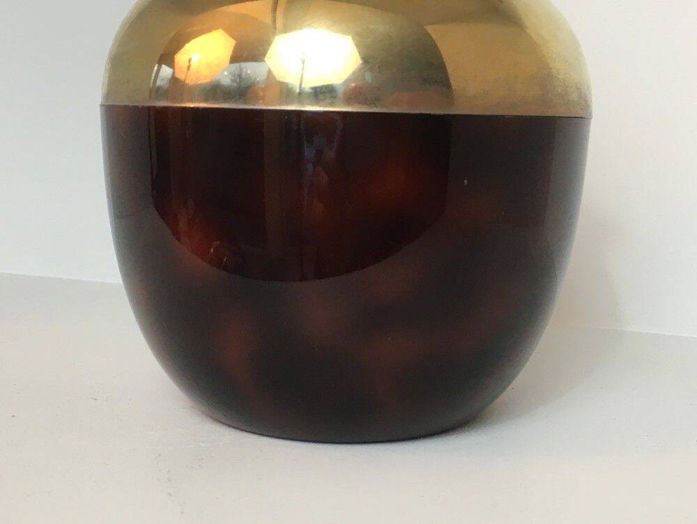 Apple-shaped ice bucket in red celluloid, gold-tone metal and plastic