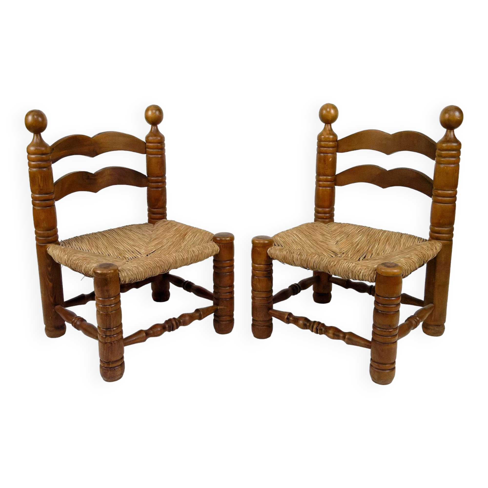 Pair of low straw chairs  circa 1940