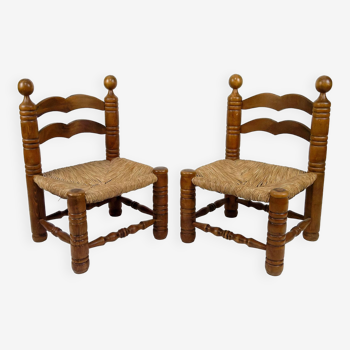 Pair of low straw chairs  circa 1940