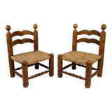 Pair of low straw chairs  circa 1940