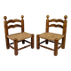 Pair of low straw chairs  circa 1940