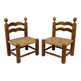 Pair of low straw chairs  circa 1940